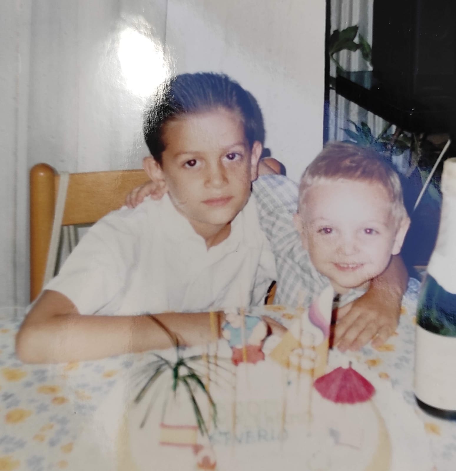 Two children sitting together at a table